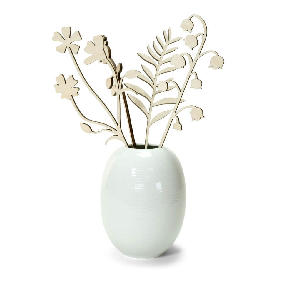 Blank houten bloemen in een vaas